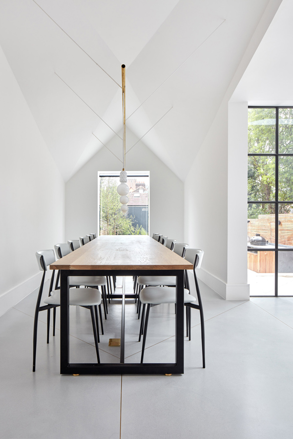 I love this North London renovation by Merrett Houmoller architects who opened up the back, adding a stunning extension with kitchen / living and dining area. Renovation, north London, architecture, interior design, remodel, chevron, parquet flooring, artists studio, limited materials, colour palette, brass, metal, crittall style, dream home, landscape garden, 45 degree angle, merrett and houmoller, Alan Williams, style, minimalism, polished concrete, clean lines, old and new, trend, blog, stylejuicer