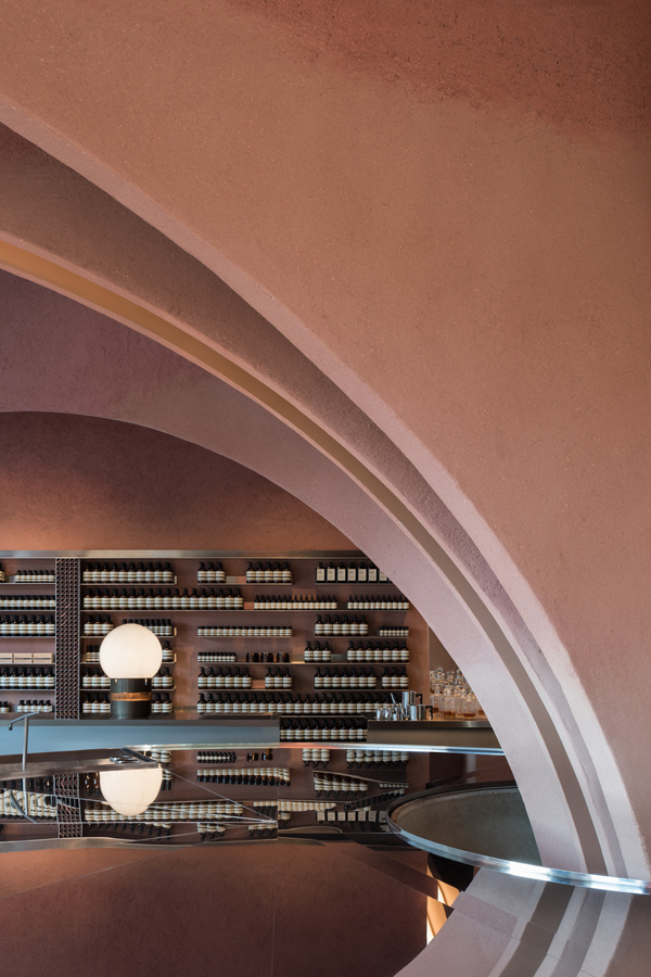 This new pink AESOP store in London features a large vaulted structure originating from a central round basin which gives the store a real sense of drama.