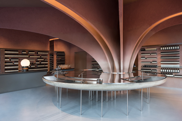 This new pink AESOP store in London features a large vaulted structure originating from a central round basin which gives the store a real sense of drama.