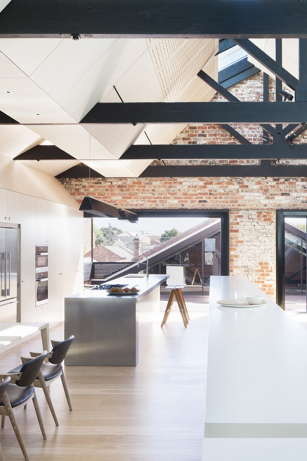 I love this converted water factory in Melbourne which house seperate living quarters for an extended family within it's beautiful heritage envelope.